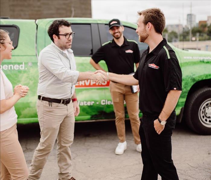 SERVPRO technician greeting clients