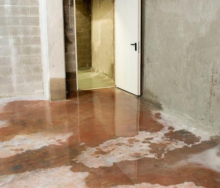 Water seeps into a concrete basement 
